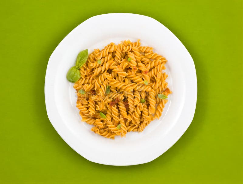 Italian pasta with tomato sauce and basil.