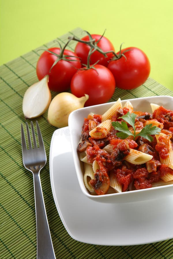 Italian pasta with tomato sauce and parmesan