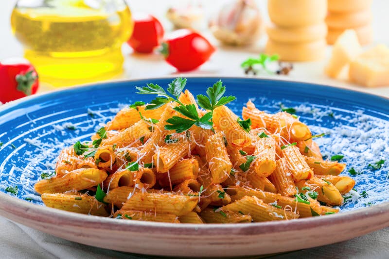 Italian Penne pasta stock image. Image of macaroni, herb - 98421631