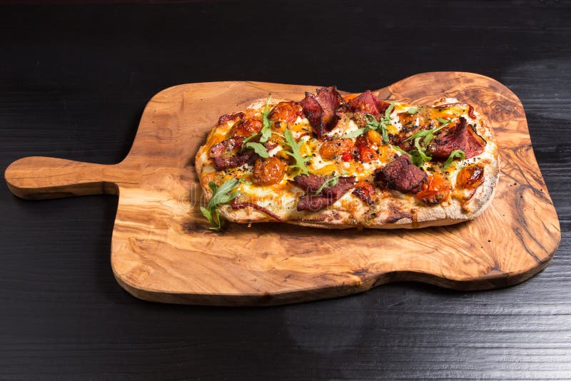 Italian Pinsa stock image. Image of table, plum, dough 268565281