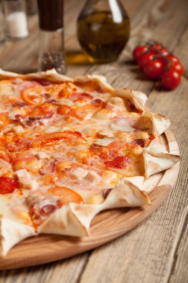 Italian pizza stock image. Image of cooking, food, black - 53263985