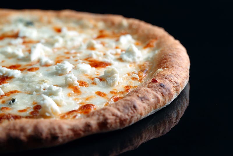 Pizza Four Cheese with Ingredients. Cheese Pizza with Arugula Leaves. Pizza on Wooden Plate