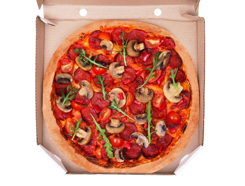 Italian pizza hot with spicy salami, arugula, cherry tomatoes, mushrooms and texas spice mix in cardboard box, isolated on white royalty free stock photography Italian pizza hot with spicy salami, arugula, cherry tomatoes, mushrooms and texas spice mix in cardboard box, isolated on white royalty free stock photography