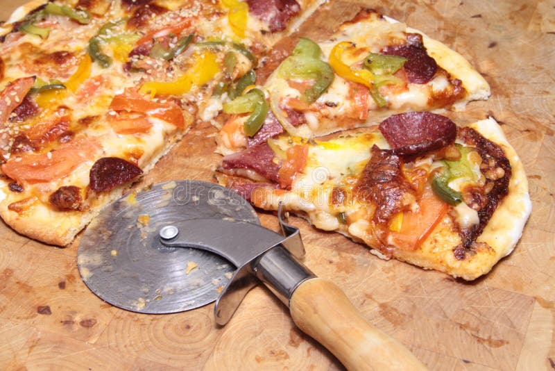 Italian Pizza with Pizza Cutter Stock Image Image of dlices
