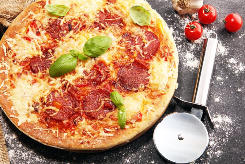 Italian Pizza with Salami, Peperoni - with Melted Cheese, Red Tomatoes ...