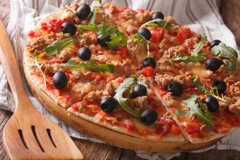 Italian Pizza with Tuna, Olives and Arugula Closeup. Horizontal Stock Photo Image of italy