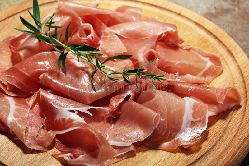 Italian Prosciutto Crudo or Jamon with Parsley. Raw Ham Stock Image