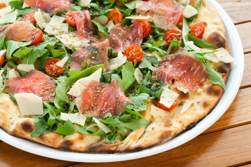 Italian Prosciutto and Rucola Pizza. Stock Photo Image of hearty