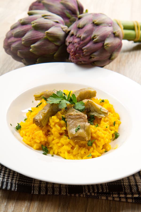 Italian risotto with saffron and artichokes. Italian risotto with saffron and artichokes