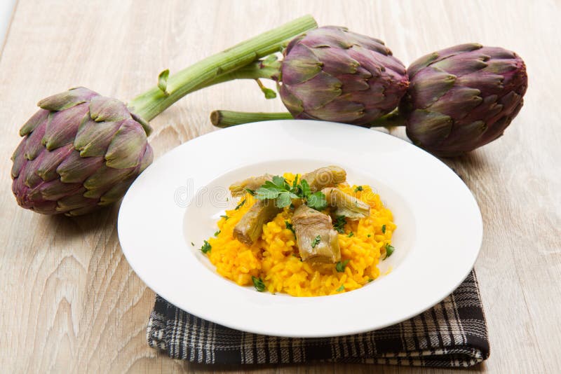 Italian risotto with saffron and artichokes. Italian risotto with saffron and artichokes