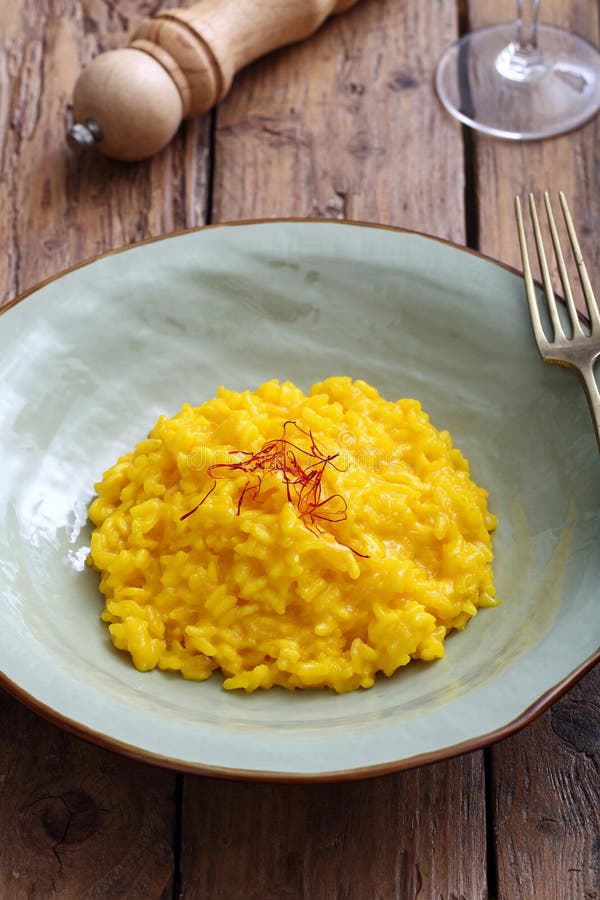 Italian risotto with saffron background