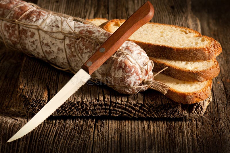 Italian salami with slice bread stock images