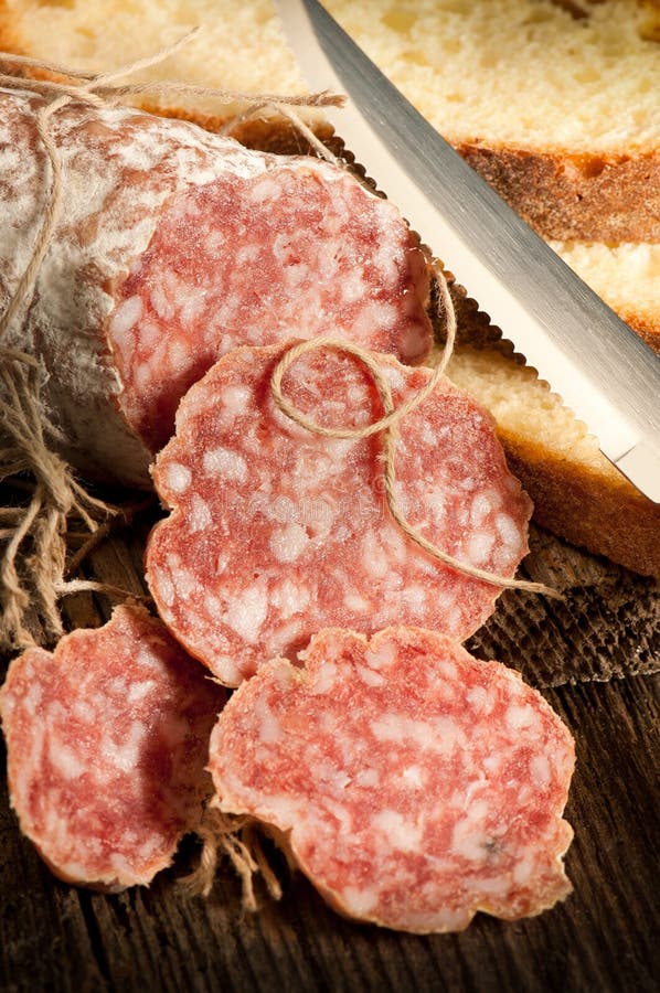 Italian salami with slice bread royalty free stock image