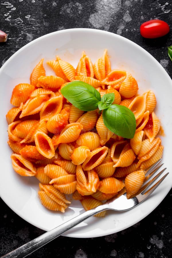 Italian Shell Pasta with Tomato Sauce, Olives and Basil, Classic Stock