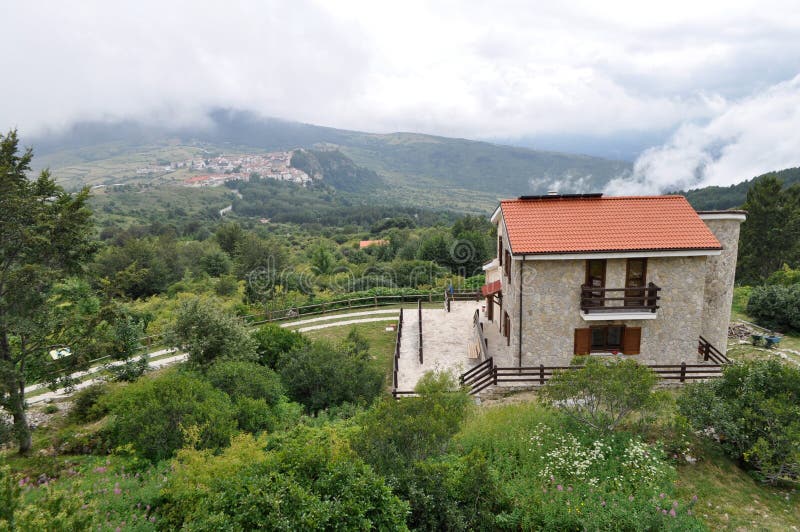 Italian small house in high mountain in the clouds