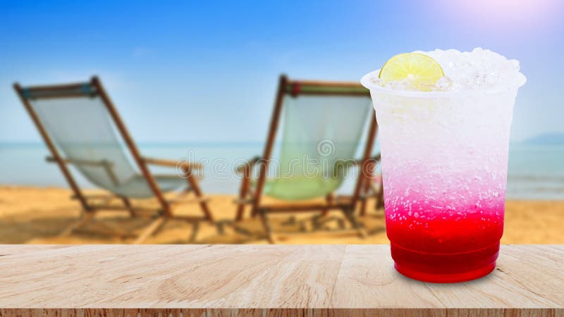 Cold Fruit Tea with a Ice in a Plastic Cup with a Lid on a Wooden Tray.  Take Away. Poster Stock Photo - Image of poster, isolated: 225505756