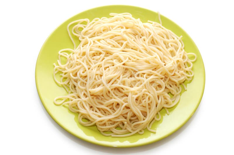 Italian spaghetti on green plate