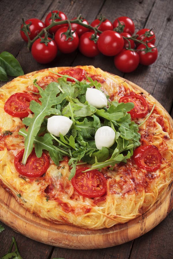 Italian spaghetti pizza stock photo. Image of tomato 75211410