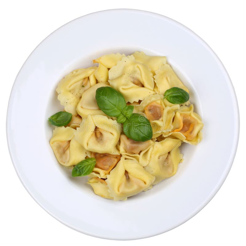 Italienskt mål för pastaTortellininudlar med isolerad basilika arkivbilder