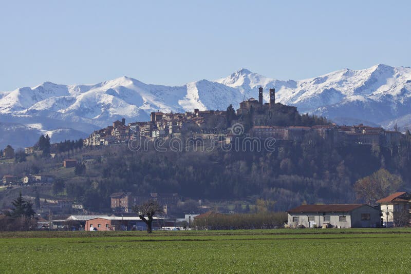 Mountains and city of Mondovi in Piemonte, Italy. Spring time and sunny day. Mountains and city of Mondovi in Piemonte, Italy. Spring time and sunny day.