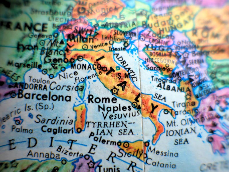 Italy and Rome focus macro shot on globe map for travel blogs, social media, website banners and backgrounds.