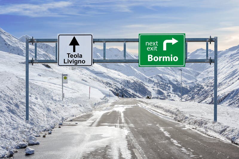 Italy ski town Bormio and Teola and Livigno road big sign with a lot of snow and mountain sky