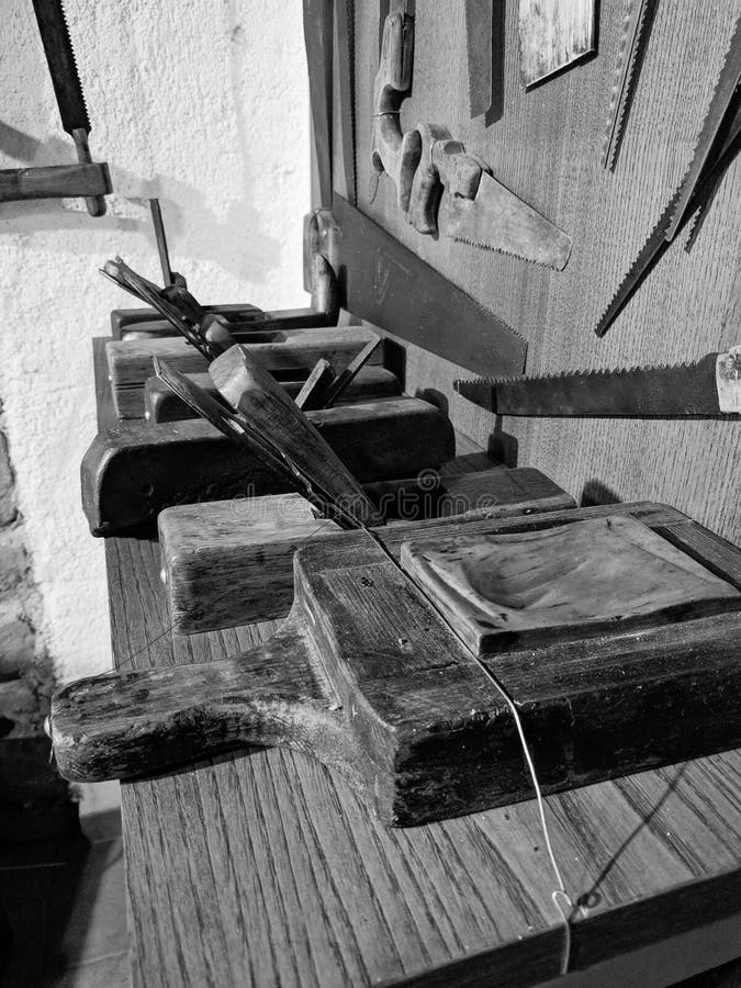 Old carpenter`s tools, on display, inside the Minucciano museum stock images Old carpenter`s tools, on display, inside the Minucciano museum stock images