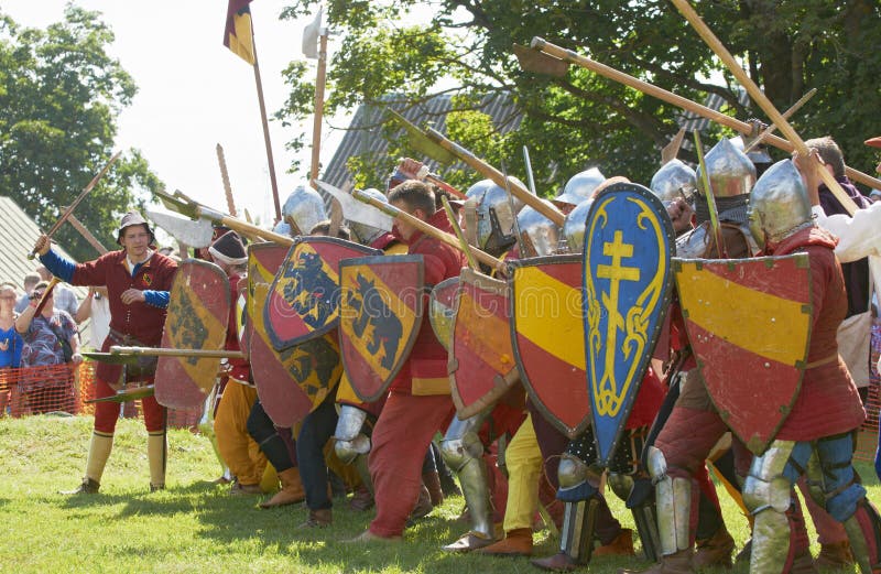 IZBORSK, RUSSIA - AUGUST 6: Unidentified men in a knightly armor take part in festival Iron hailstones on August, 6 2011 in Izborsk, the Pskov area, Russia.