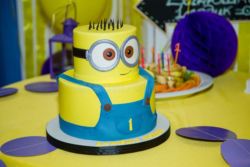 Izmail, Ukraine - 2016. Editorial use. Birthday cake in minion shape. Cartoon character cake for child party. Thematic event. Candy bar