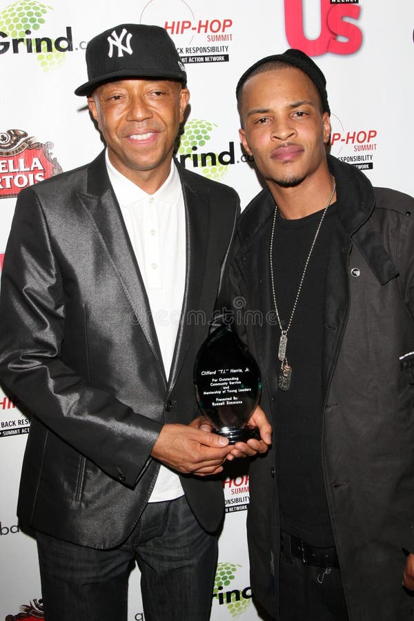 Russell Simmons and T.I. at the 'Celebration to Grammy Nominees' Post Grammy Party. Private Location, Beverly Hills, CA. 02-08-09. Russell Simmons and T.I. at the 'Celebration to Grammy Nominees' Post Grammy Party. Private Location, Beverly Hills, CA. 02-08-09