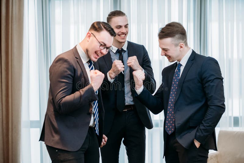 Yes, it`s a business success. happy smiling managers celebrate profitable deal or company financial growth. Yes, it`s a business success. happy smiling managers celebrate profitable deal or company financial growth.