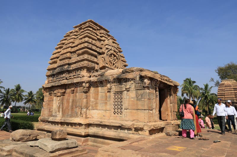 Pattadakal, also called Raktapura, is a complex of 7th and 8th century CE Hindu and Jain temples in northern Karnataka, India. Located on the west bank of the Malaprabha River in Bagalkot district, this UNESCO World Heritage Site[1][2] is 23 kilometres (14 mi) from Badami and about 9.7 kilometres (6 mi) from Aihole, both of which are historically significant centres of Chalukya monuments.[3][4] The monument is a protected site under Indian law and is managed by the Archaeological Survey of India. Pattadakal, also called Raktapura, is a complex of 7th and 8th century CE Hindu and Jain temples in northern Karnataka, India. Located on the west bank of the Malaprabha River in Bagalkot district, this UNESCO World Heritage Site[1][2] is 23 kilometres (14 mi) from Badami and about 9.7 kilometres (6 mi) from Aihole, both of which are historically significant centres of Chalukya monuments.[3][4] The monument is a protected site under Indian law and is managed by the Archaeological Survey of India