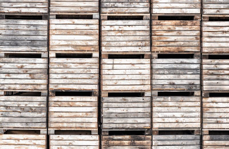 Old empty apple crates stacked up. Old empty apple crates stacked up