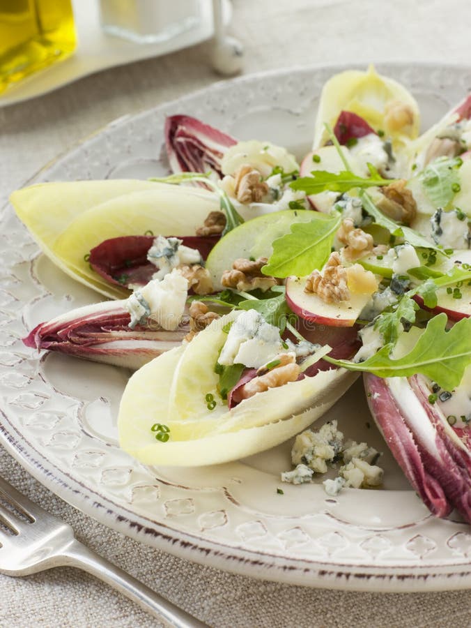 Salad of Chicory Walnuts and Apple with Roquefort Vinaigrette. Salad of Chicory Walnuts and Apple with Roquefort Vinaigrette