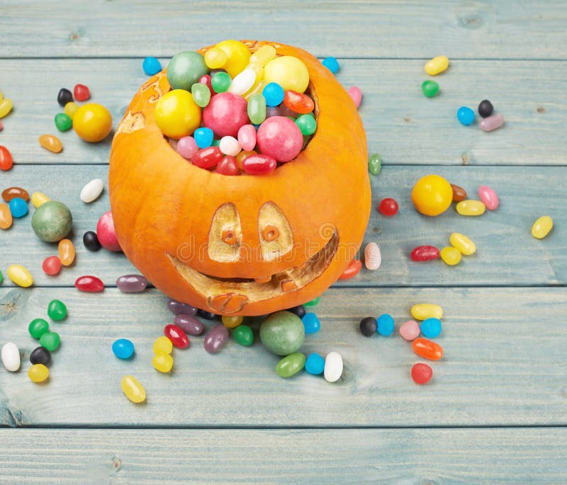 Jack O Lantern Pumpkin Filled with Candies Stock Photo - Image of ...