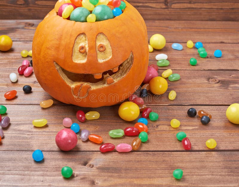 Jack O Lantern Pumpkin Filled with Candies Stock Photo - Image of ...