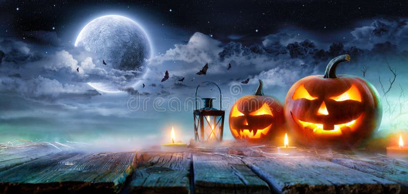 Jack O’ Lanterns Glowing At Moonlight In The Spooky Night stock illustration