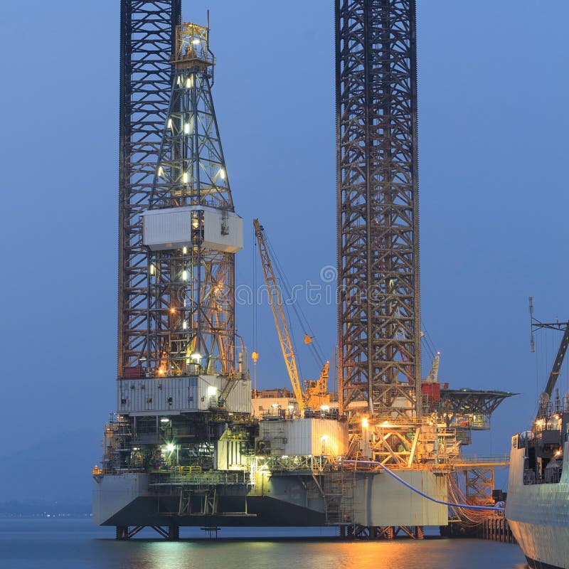 Jack Up Oil Drilling Rig In The Shipyard Stock Image Image of evening