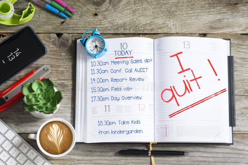 I quit, text written by stressed employee on personal agenda after a hard day. I quit, text written by stressed employee on personal agenda after a hard day