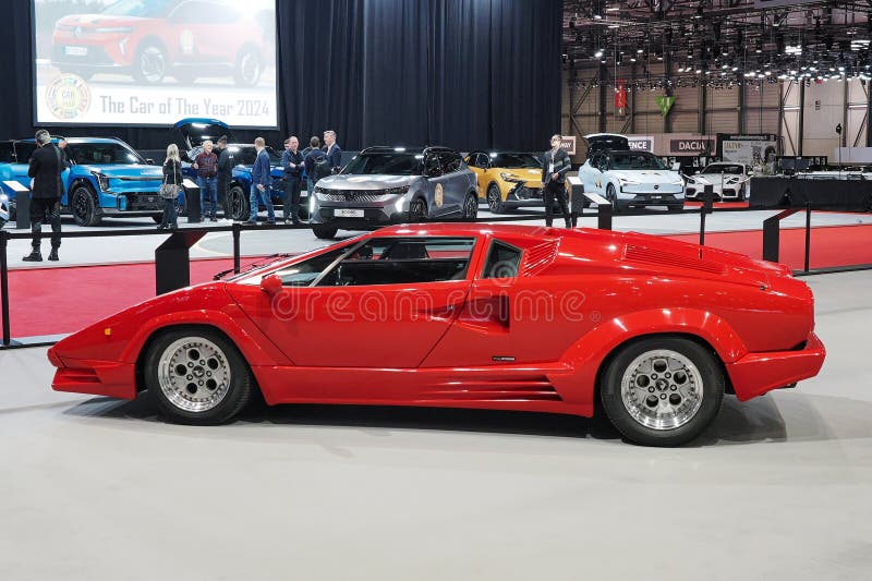 Named to honour the company's twenty-fifth anniversary in 1988, the 25th Anniversary Countach, although mechanically very similar to the 5000QV, sported considerable restyling done by Horacio Pagani. The Lamborghini Countach is a rear mid-engine, rear-wheel-drive sports car produced by the Italian automobile manufacturer Lamborghini from 1974 until 1990. It is one of the many exotic designs developed by Italian design house Bertone, which pioneered and popularized the sharply angled "Italian Wedge" shape. Named to honour the company's twenty-fifth anniversary in 1988, the 25th Anniversary Countach, although mechanically very similar to the 5000QV, sported considerable restyling done by Horacio Pagani. The Lamborghini Countach is a rear mid-engine, rear-wheel-drive sports car produced by the Italian automobile manufacturer Lamborghini from 1974 until 1990. It is one of the many exotic designs developed by Italian design house Bertone, which pioneered and popularized the sharply angled "Italian Wedge" shape.