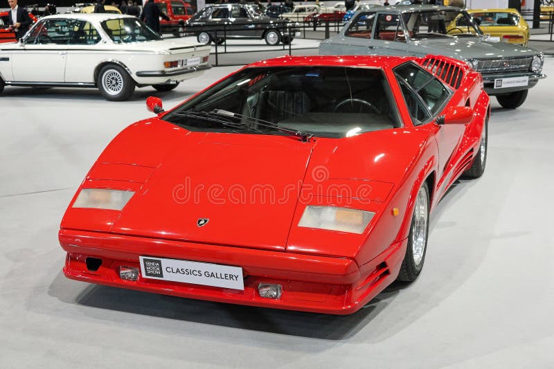 Named to honour the company's twenty-fifth anniversary in 1988, the 25th Anniversary Countach, although mechanically very similar to the 5000QV, sported considerable restyling done by Horacio Pagani. The Lamborghini Countach is a rear mid-engine, rear-wheel-drive sports car produced by the Italian automobile manufacturer Lamborghini from 1974 until 1990. It is one of the many exotic designs developed by Italian design house Bertone, which pioneered and popularized the sharply angled "Italian Wedge" shape. Named to honour the company's twenty-fifth anniversary in 1988, the 25th Anniversary Countach, although mechanically very similar to the 5000QV, sported considerable restyling done by Horacio Pagani. The Lamborghini Countach is a rear mid-engine, rear-wheel-drive sports car produced by the Italian automobile manufacturer Lamborghini from 1974 until 1990. It is one of the many exotic designs developed by Italian design house Bertone, which pioneered and popularized the sharply angled "Italian Wedge" shape.