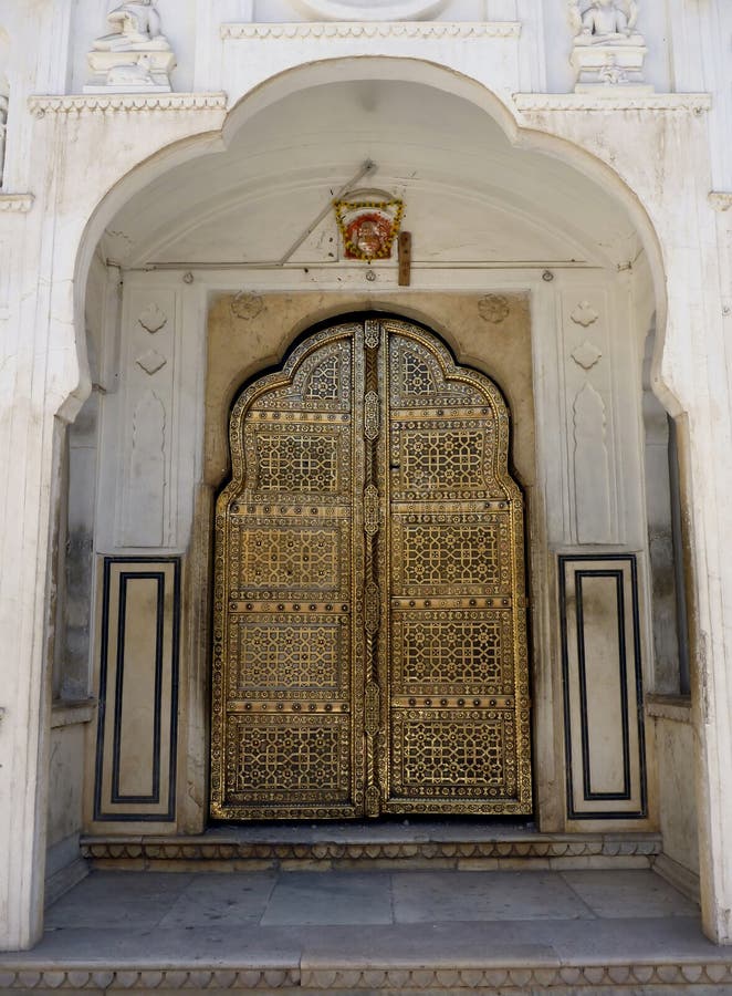 Jaipur gold palace door stock photo. Image of carving 15024354