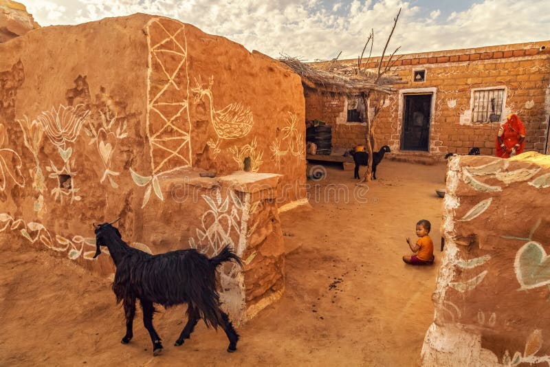 Rural Indian village with mud huts at Jaisalmer, Rajasthan, India royalty free stock image