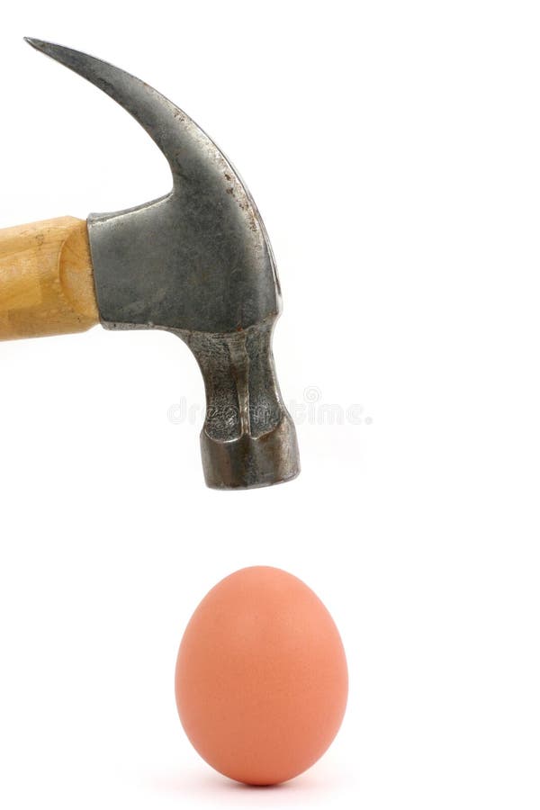 Hammer and egg, concept of power. Hammer and egg, concept of power