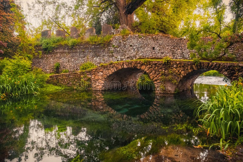 Dreamlike medieval fantasy forest fairy landscape river bridge . Dreamlike medieval fantasy forest fairy landscape river bridge .