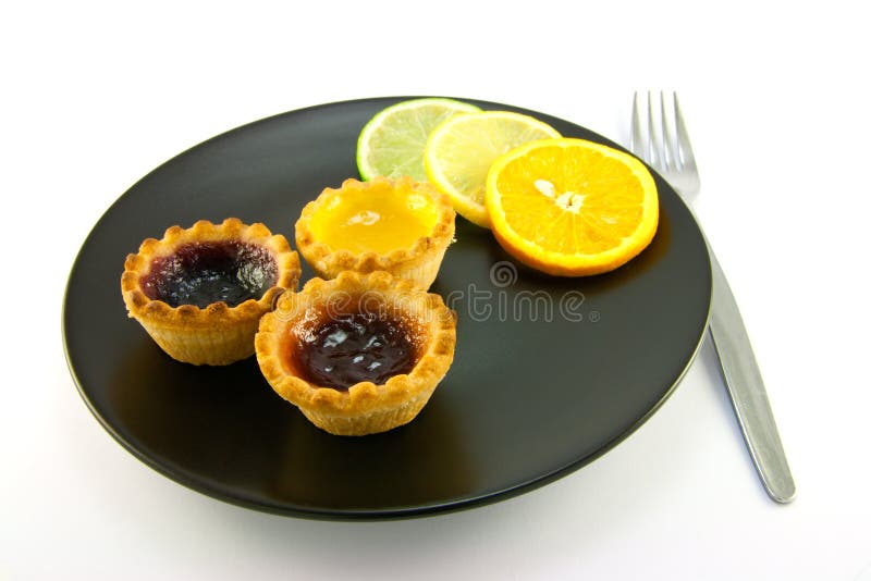 Jam Tarts with Citrus Slices and Fork