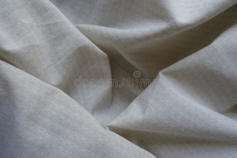 Jammed beige cotton fabric with circles pattern royalty free stock photography