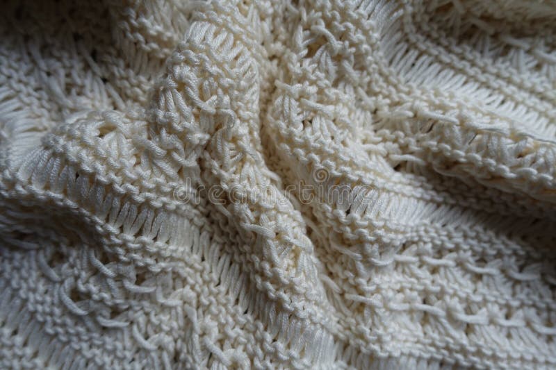 Jammed beige handmade crochet lacy fabric stock photo