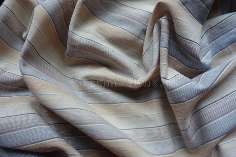 Jammed light beige, blue and grey striped cotton royalty free stock photos