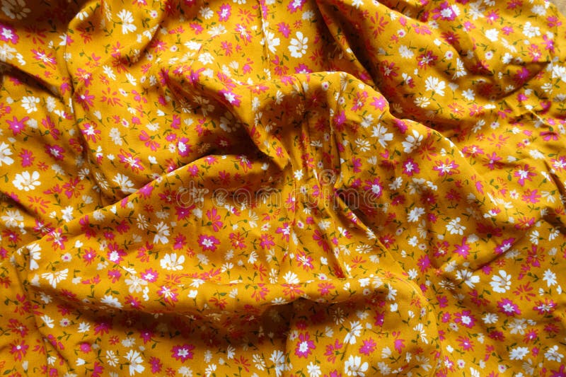 Jammed yellow, white and pink fabric stock image